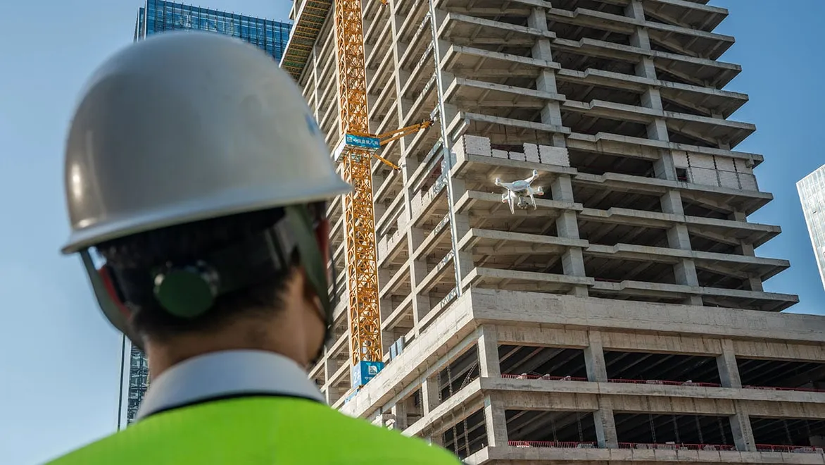 Drone surveying a high-rise façade